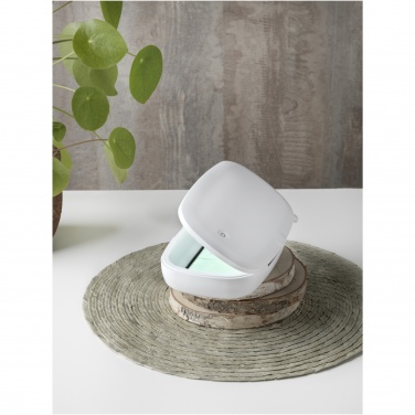 Logotrade Ideja dāvanas foto: Kapsulas UV viedtālruņa dezinfekcijas līdzeklis ar 5 W bezvadu uzlādes paliktni